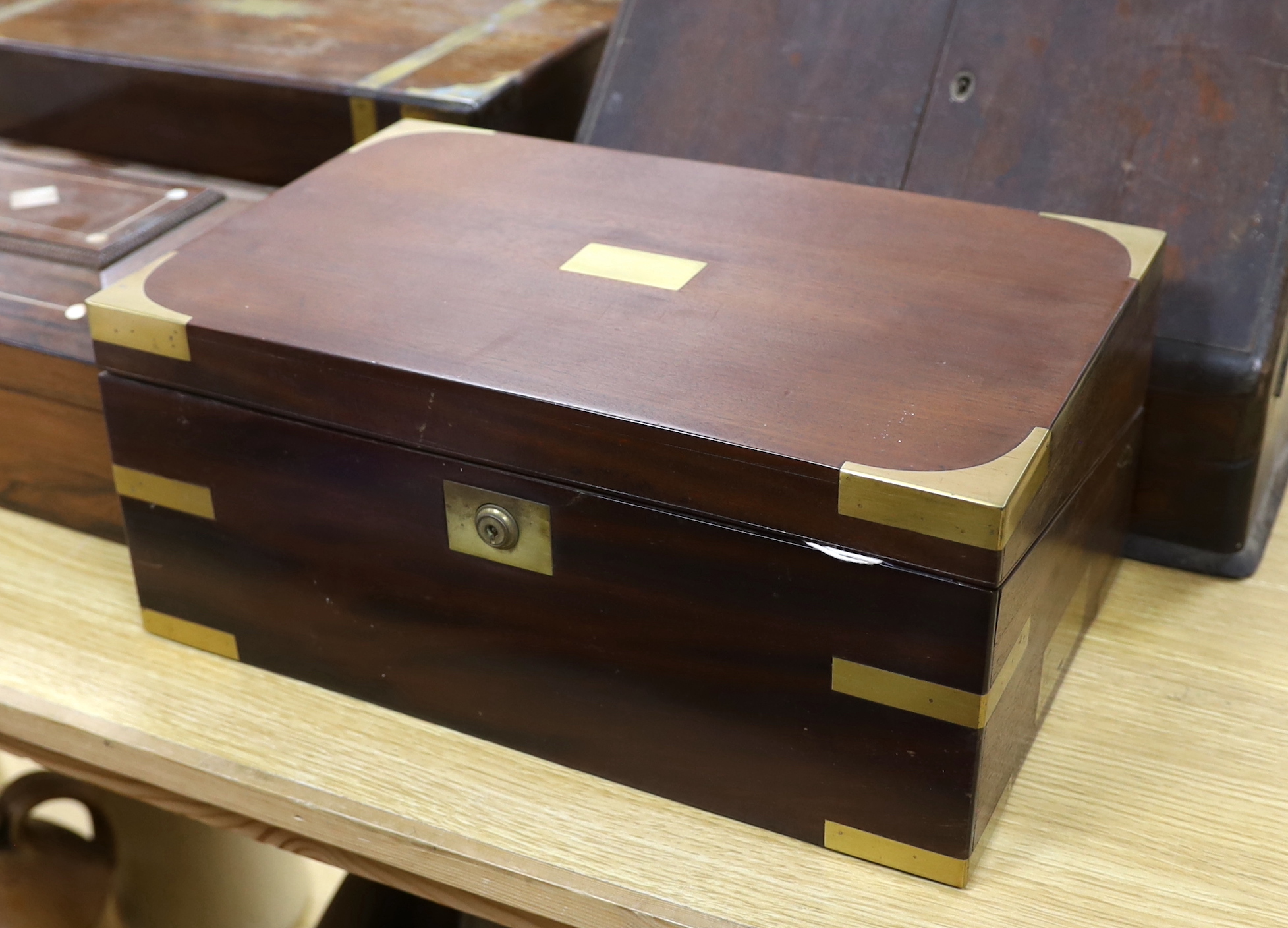 Two 19th century brass mounted writing slopes, a stationery cabinet and a work box